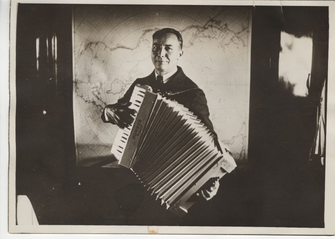 Playing the accordion.