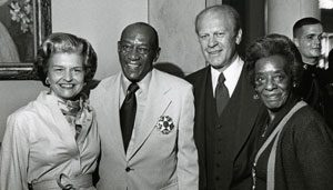 Jesse and Ruth Owens are pictured with President Gerald Ford and First Lady Betty Ford after the 1976 ceremony to award Owens the Presidential Medal of Freedom.