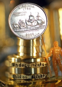Trophy with Coin affixed and miniature man standing to side